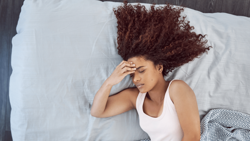 woman hungover bed